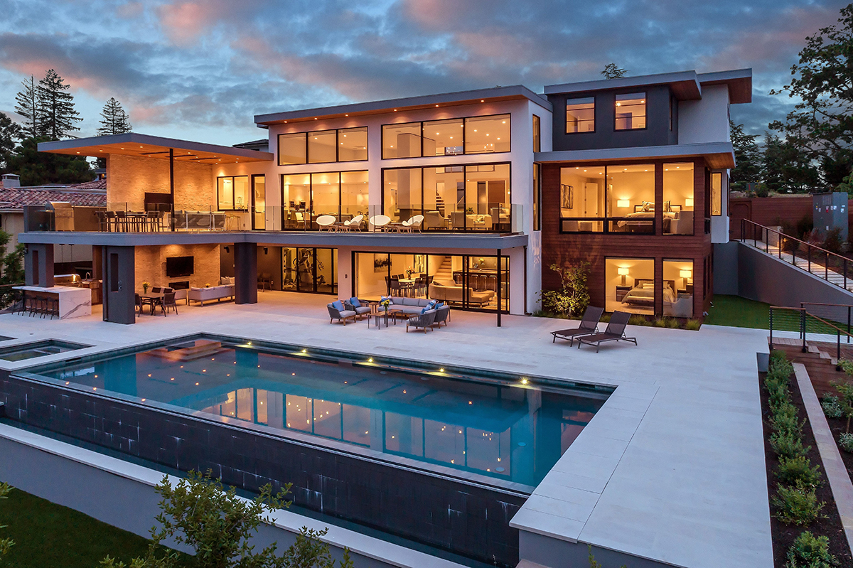 Luxury modern estate with pool and contemporary architecture showcasing premium lifestyle concierge services