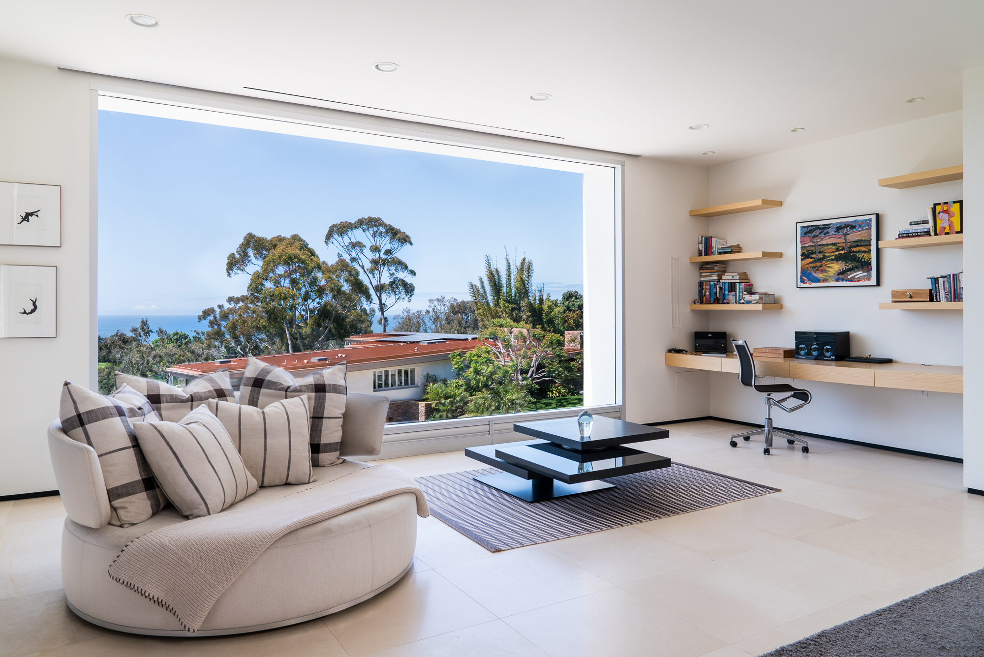 Elegant luxury interior design featuring modern living space with panoramic windows and sophisticated furnishings